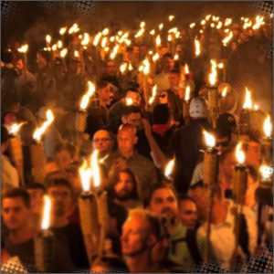 Line of people traveling by torchlight