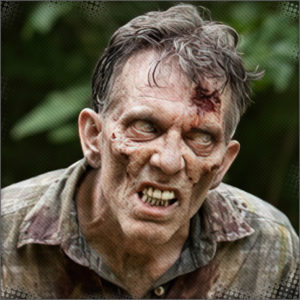 A ghoul or zombie attacks the two