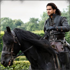 Chance riding his black stallion Toby