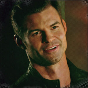 Emeric, leader of the Dahlia, smiling